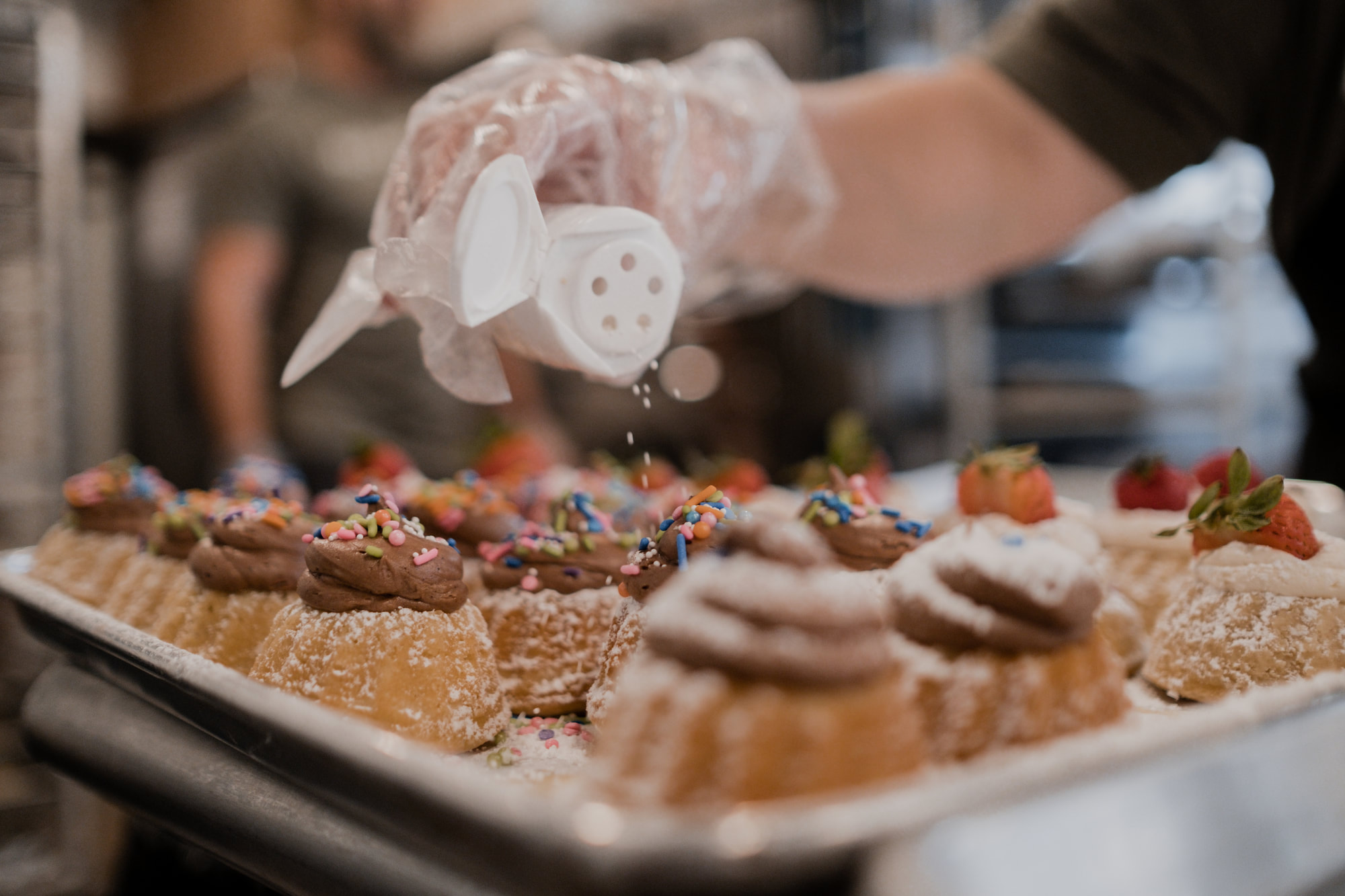 Preparing baby cakes for an event
